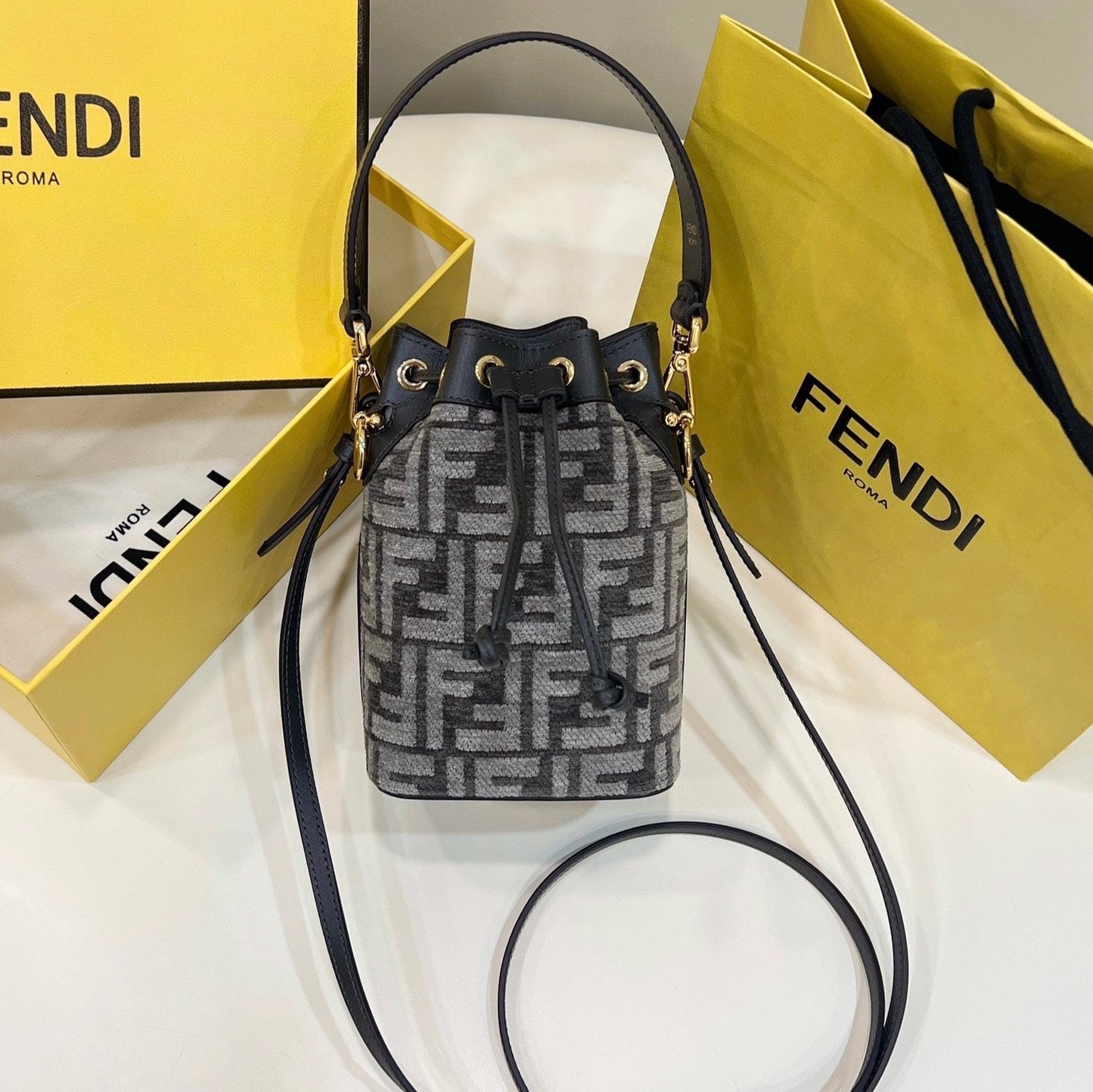Luxury FendiMON TRESOR MINI 18 BAG IN BLACK MIX GREY FF FABRIC WITH GOLD HARDWARE