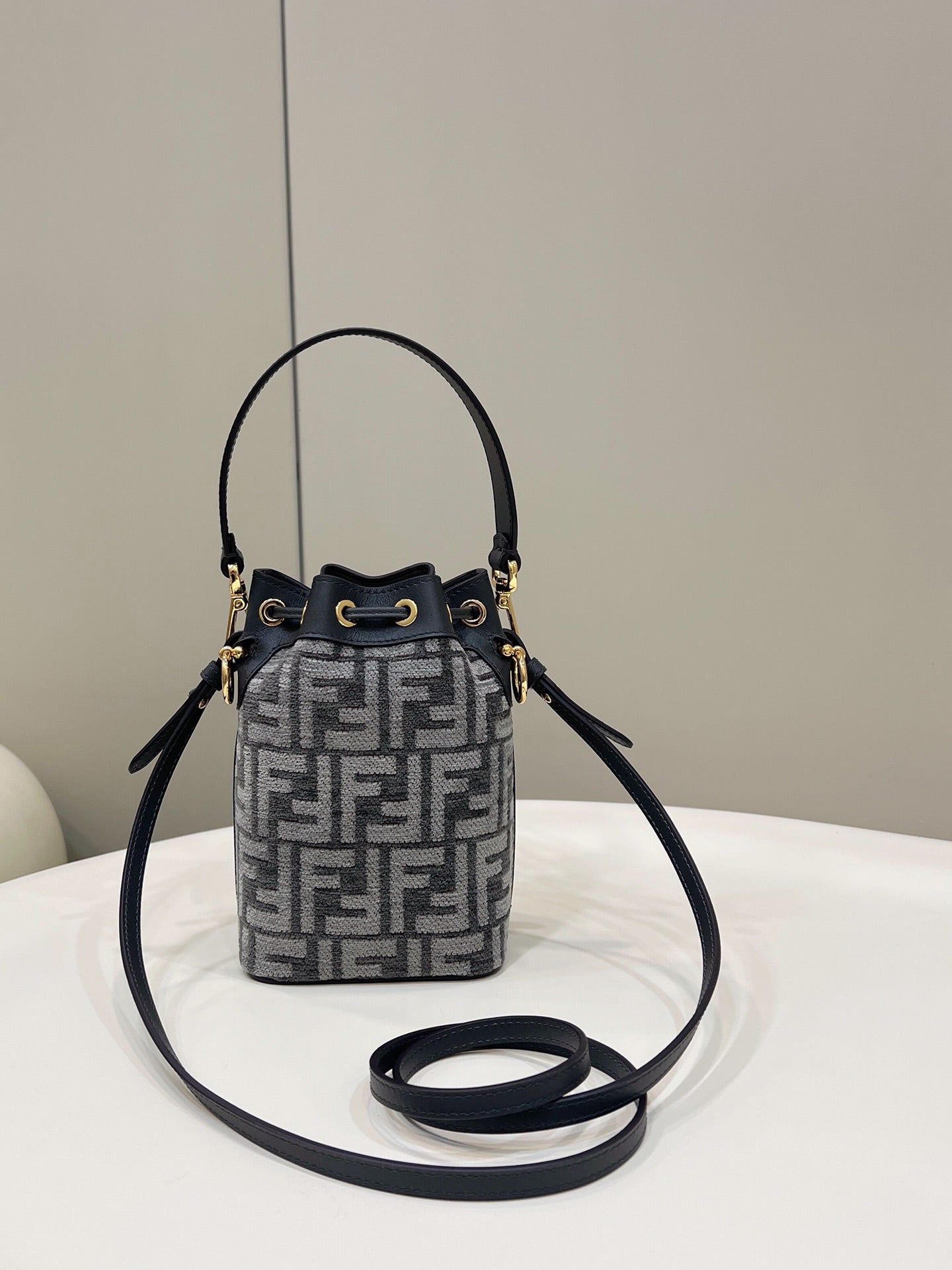 Luxury FendiMON TRESOR MINI 18 BAG IN BLACK MIX GREY FF FABRIC WITH GOLD HARDWARE