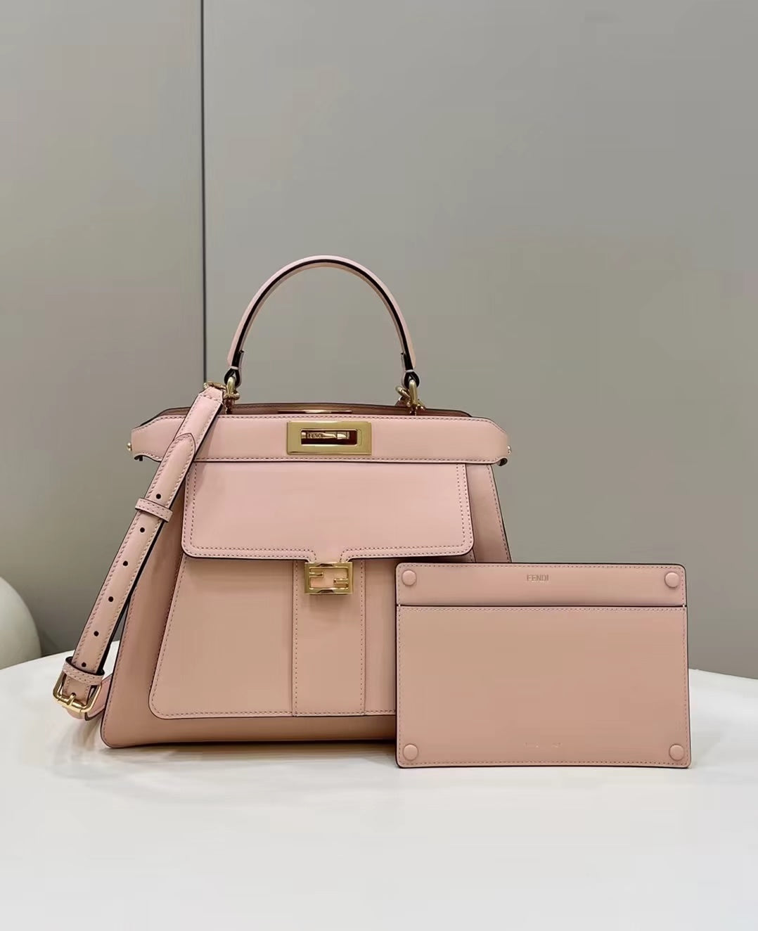 Luxury FendiLuxury FendiPEEKABOO 33 BAG IN LIGHT PINK CALFSKIN WITH STRAP GOLD HARDWARE