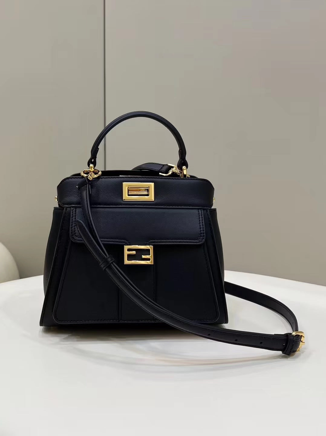 Luxury FendiLuxury FendiPEEKABOO MINI 23 BAG IN BLACK CALFSKIN WITH GOLD HARDWARE