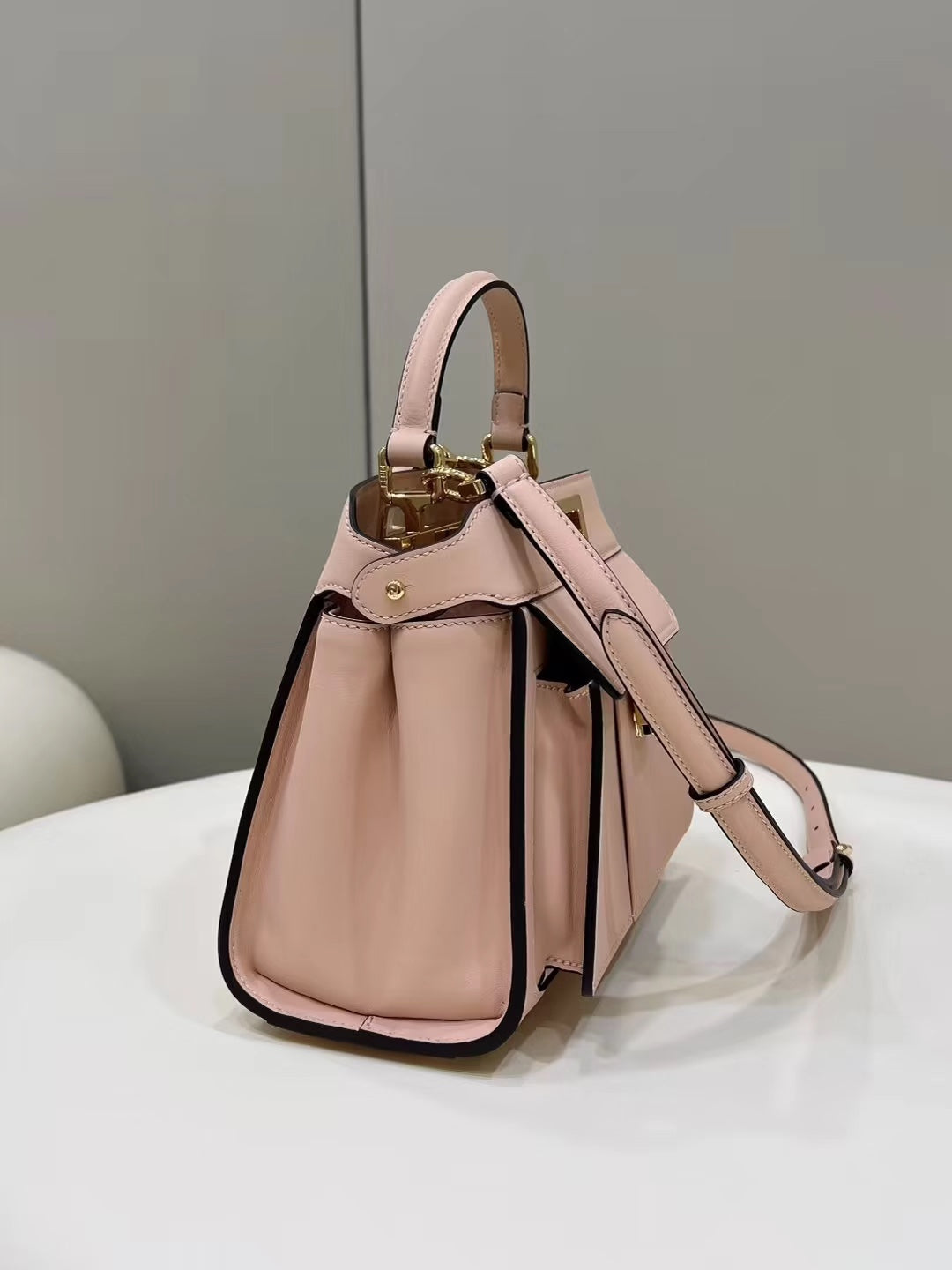 Luxury FendiLuxury FendiPEEKABOO MINI 23 BAG IN LIGHT PINK CALFSKIN WITH GOLD HARDWARE
