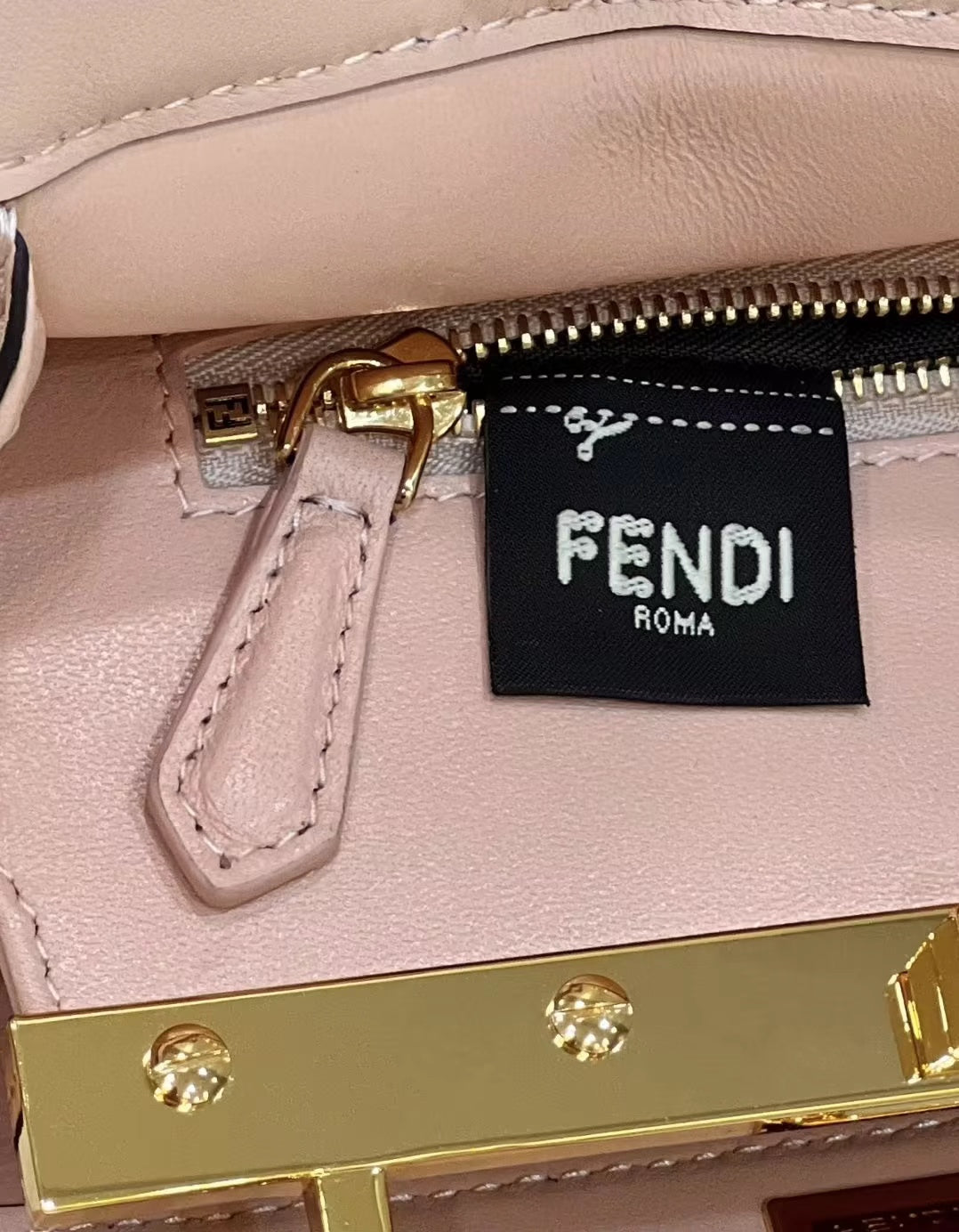Luxury FendiLuxury FendiPEEKABOO MINI 23 BAG IN LIGHT PINK CALFSKIN WITH GOLD HARDWARE