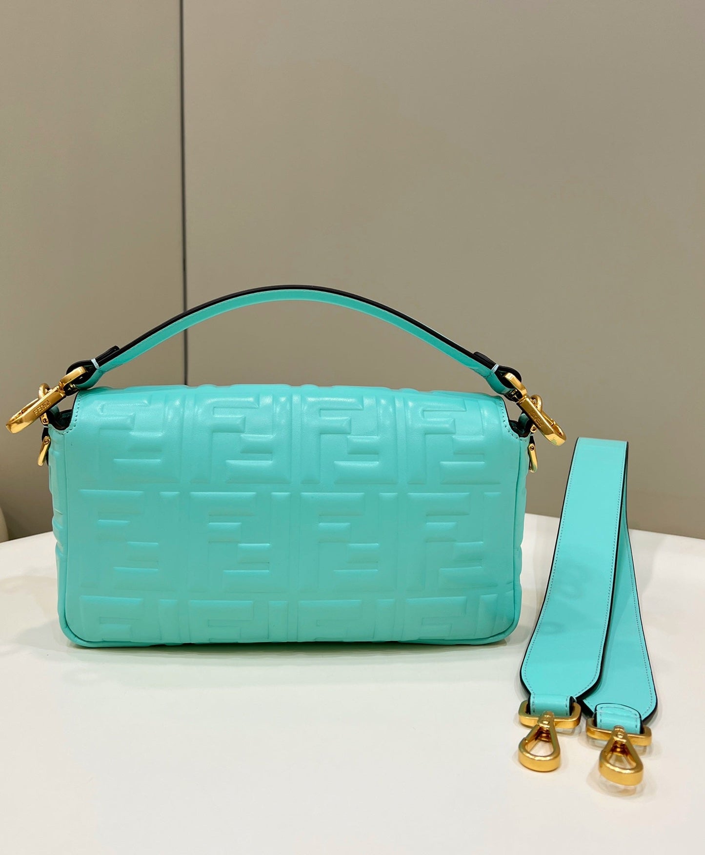 Luxury FendiBAGUETTE WITH FF MOTIF 27 IN TURQUOISE SOFT LAMBSKIN GOLD HARDWARE