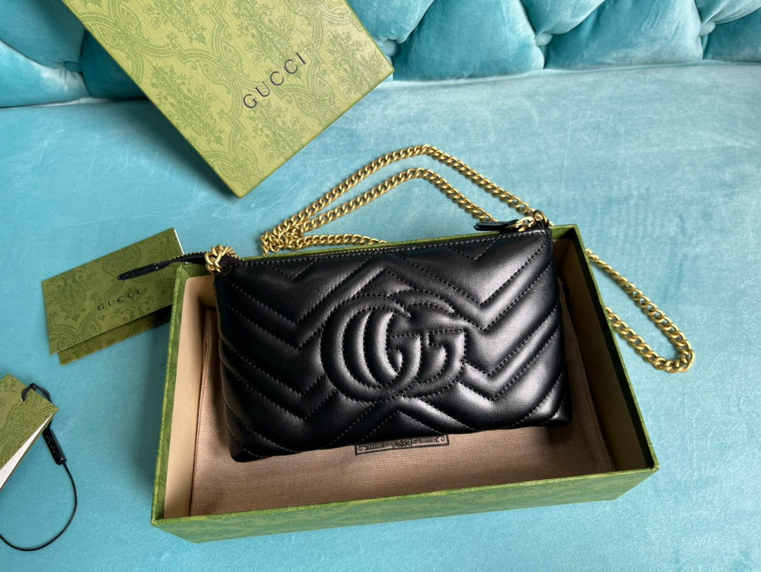 Luxury Gucci GG MARMONT MINI 22 HANDBAG IN BLACK CALFSKIN