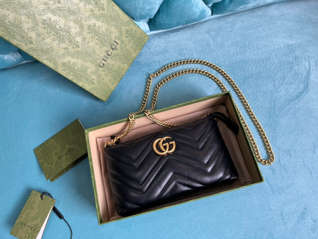 Luxury Gucci GG MARMONT MINI 22 HANDBAG IN BLACK CALFSKIN