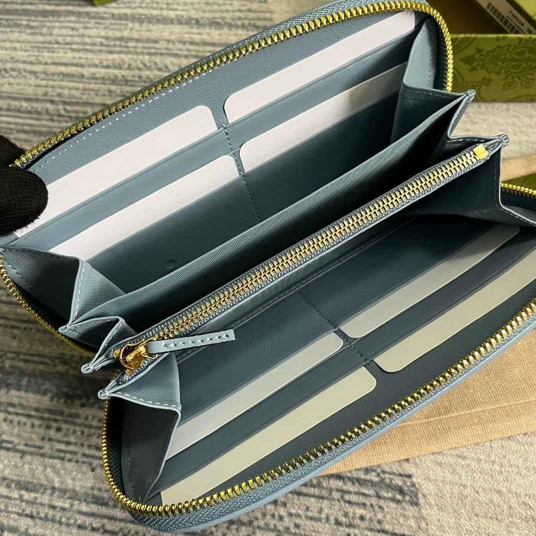 Luxury Gucci GG BLONDIE 21 FULL ZIP WALLET IN BLUE PASTEL CALFSKIN