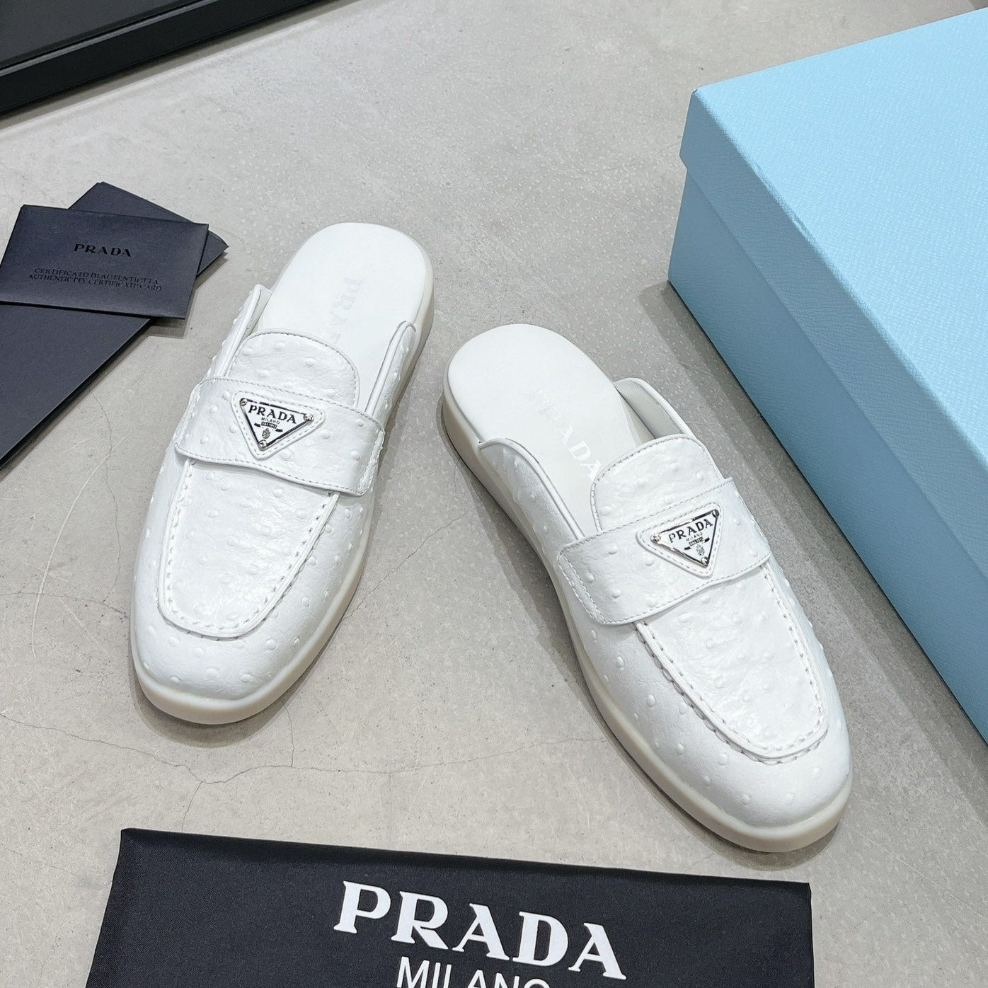 Luxury PradaOSTRICH PATTERN MULES WHITE CALFSKIN