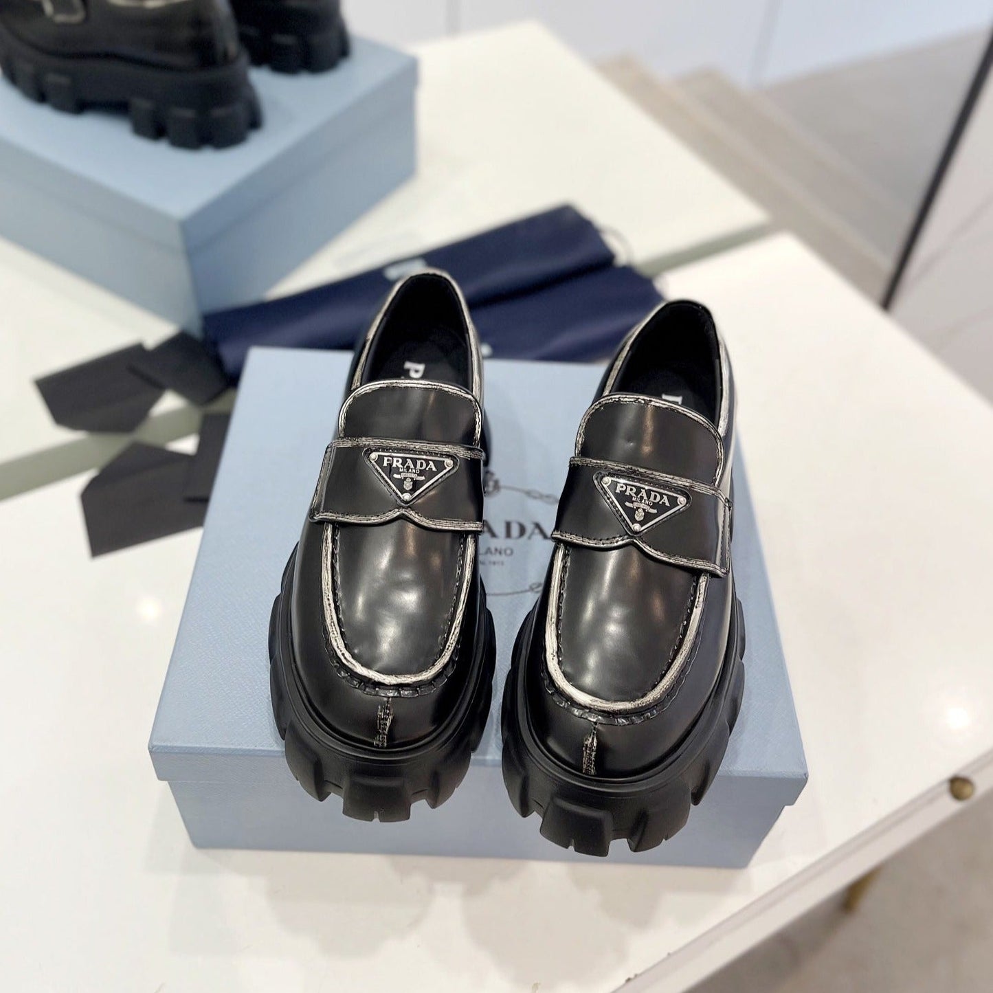 Luxury PradaBRUSHED LEATHER MONOLITH LOAFERS BLACK-SILVER BORDER