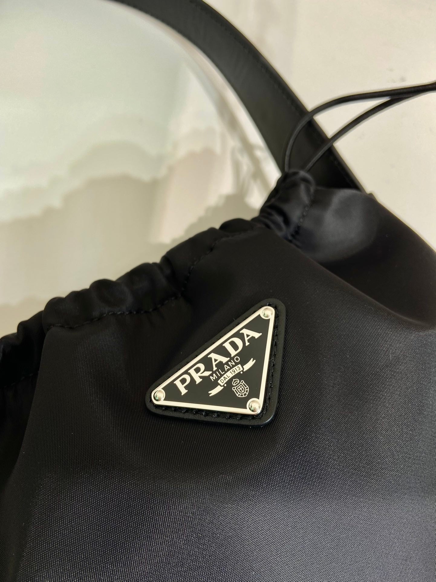 Luxury PradaSMALL DRAWSTRING BAG 23 IN BLACK RE-NYLON