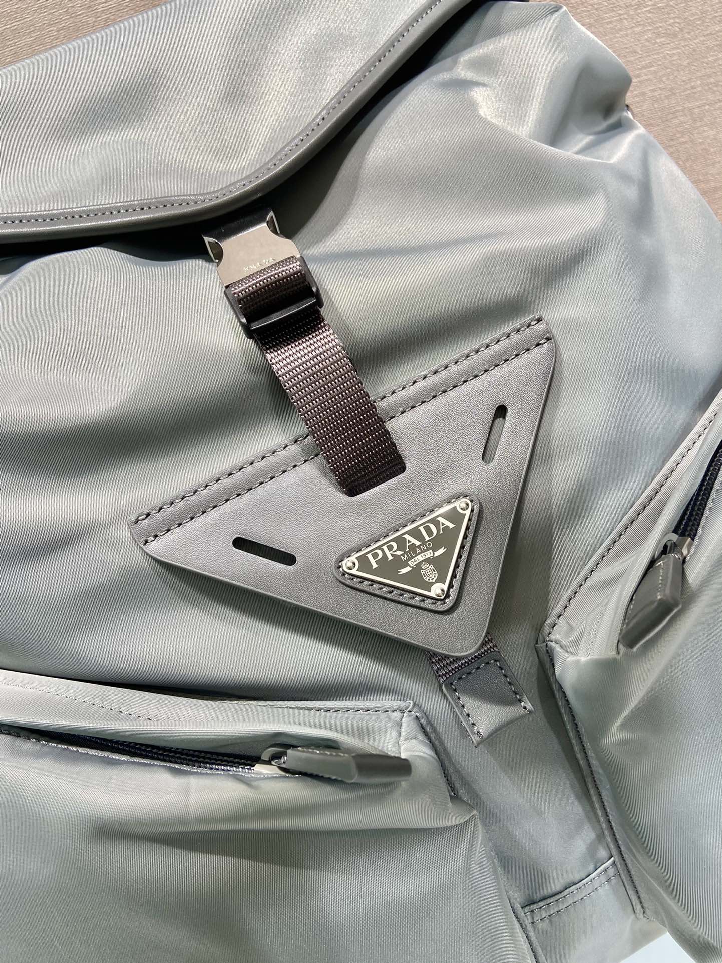 Luxury PradaTRIANGLE LOGO BACKPACK 45 IN ASH GRAY RE-NYLON