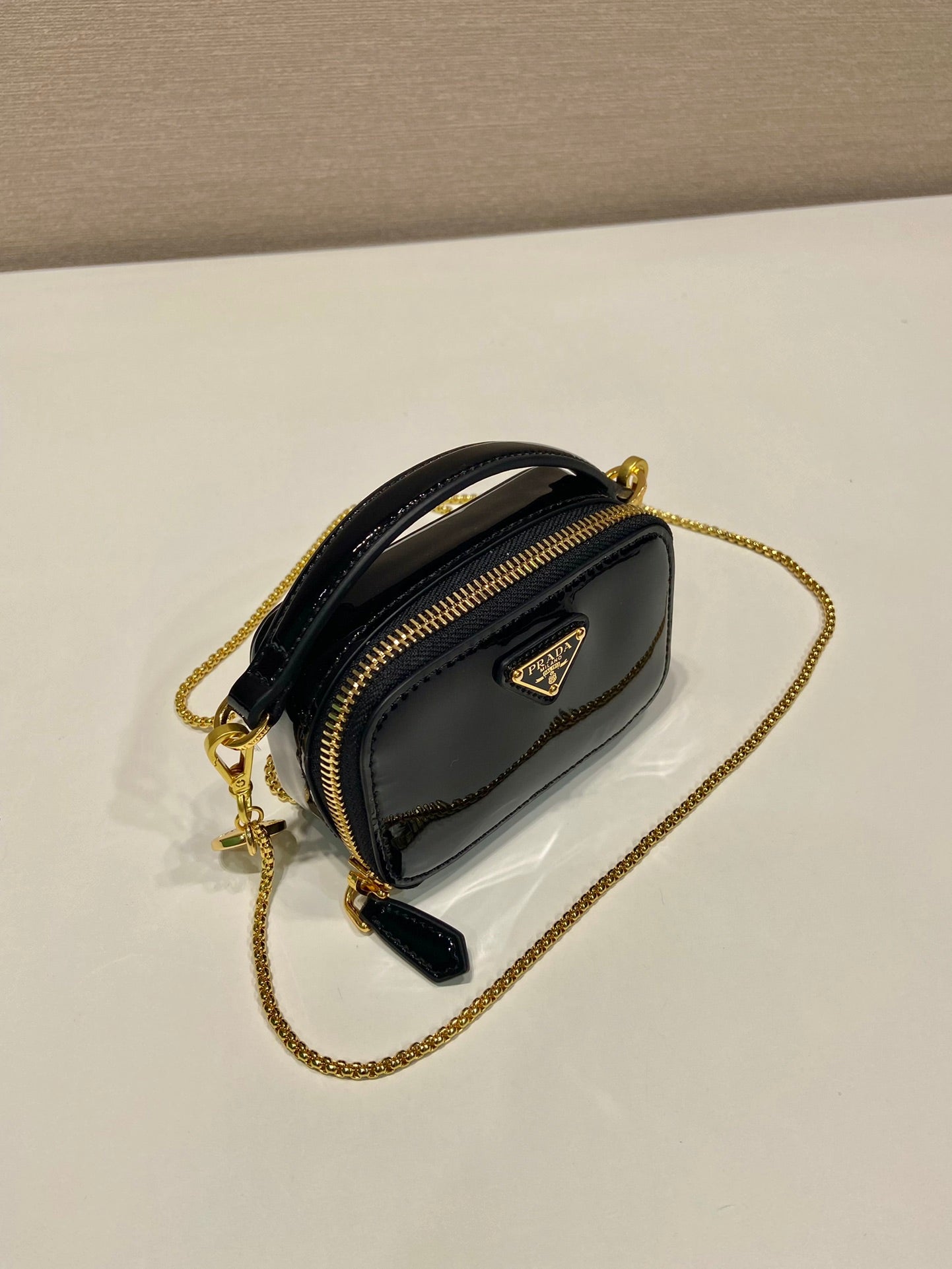 Luxury PradaMINI HAND BAG 11 WITH GOLD STRAP IN BLACK PATENT CALFSKIN