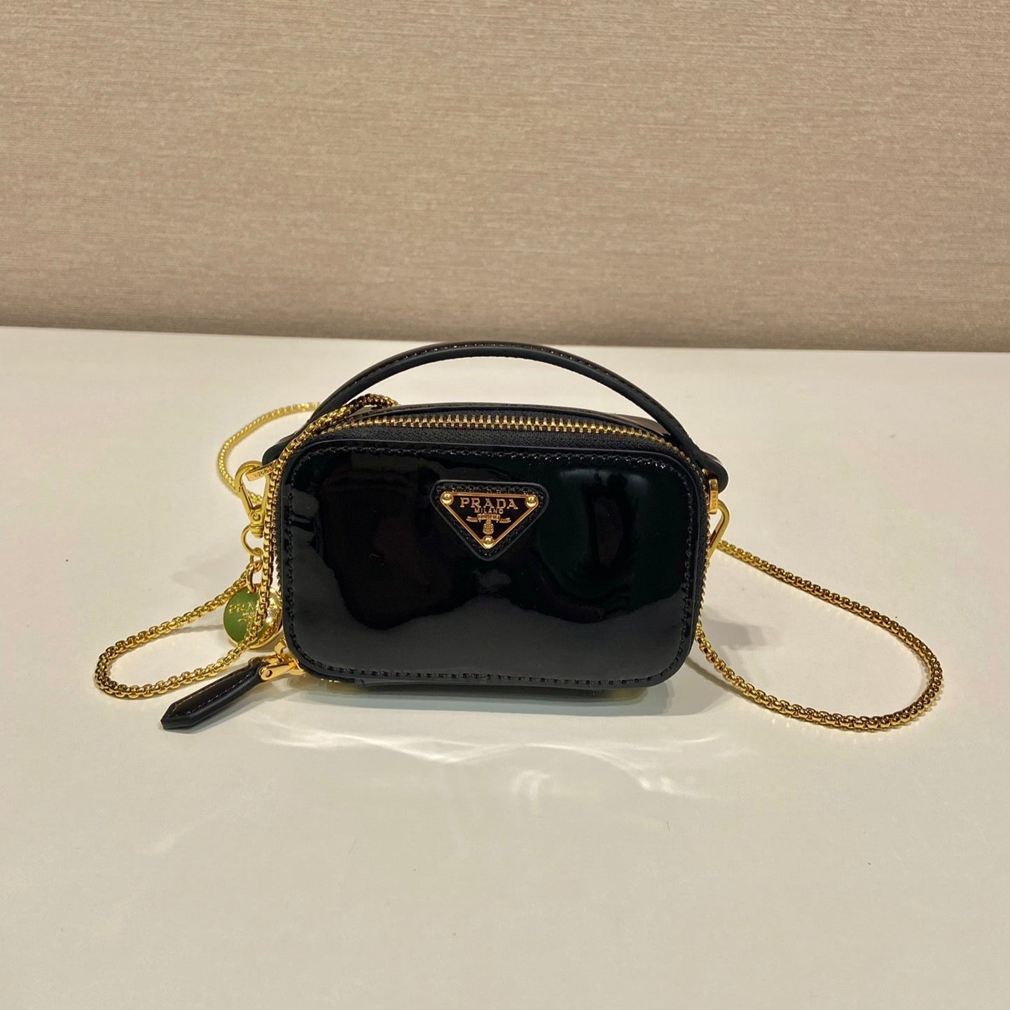Luxury PradaMINI HAND BAG 11 WITH GOLD STRAP IN BLACK PATENT CALFSKIN