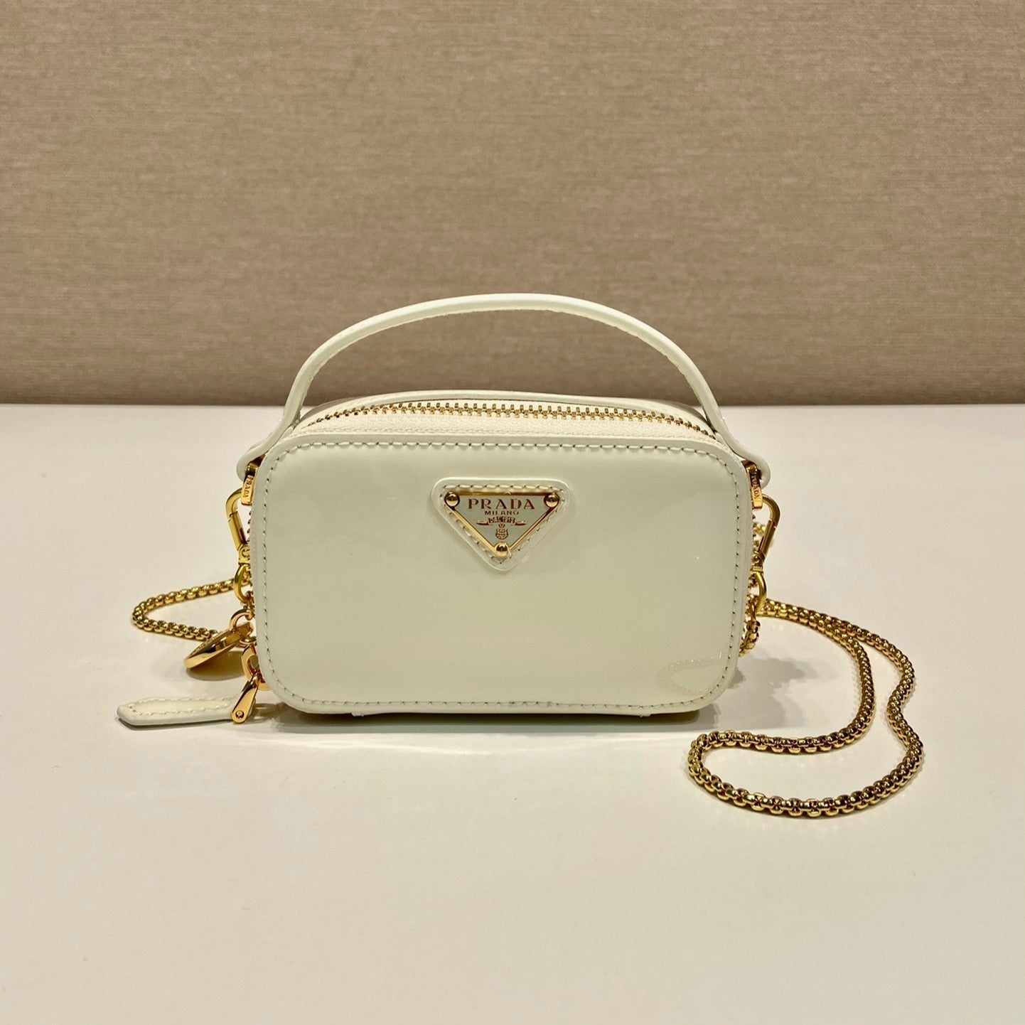 Luxury PradaMINI HAND BAG 11 WITH GOLD STRAP IN WHITE PATENT CALFSKIN