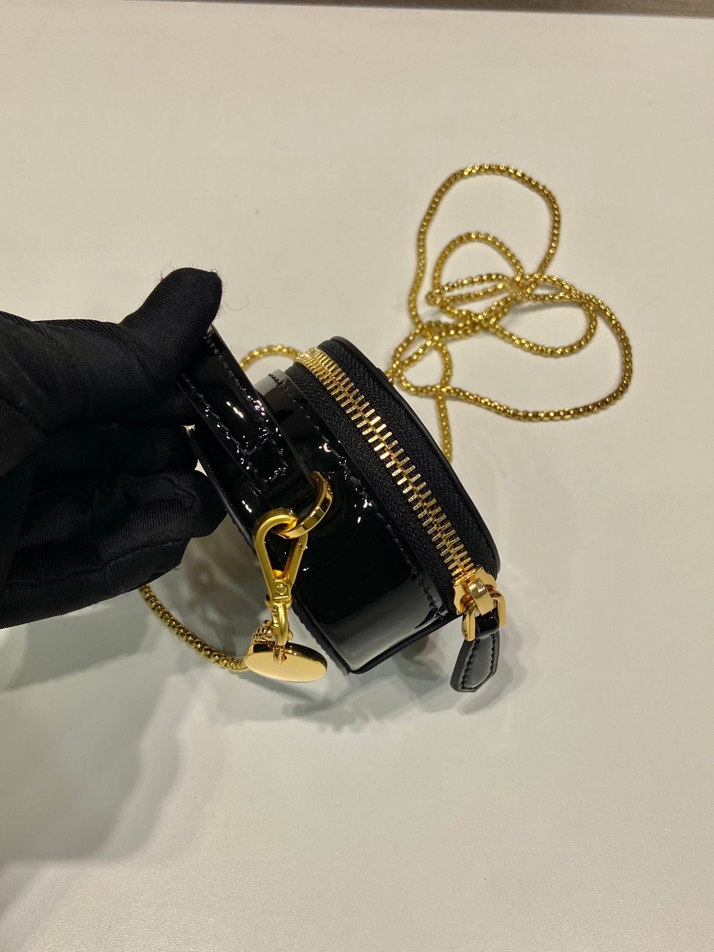 Luxury PradaMINI ROUND BAG 8 IN BLACK GLOSSY CALFSKIN GOLD HARDWARE