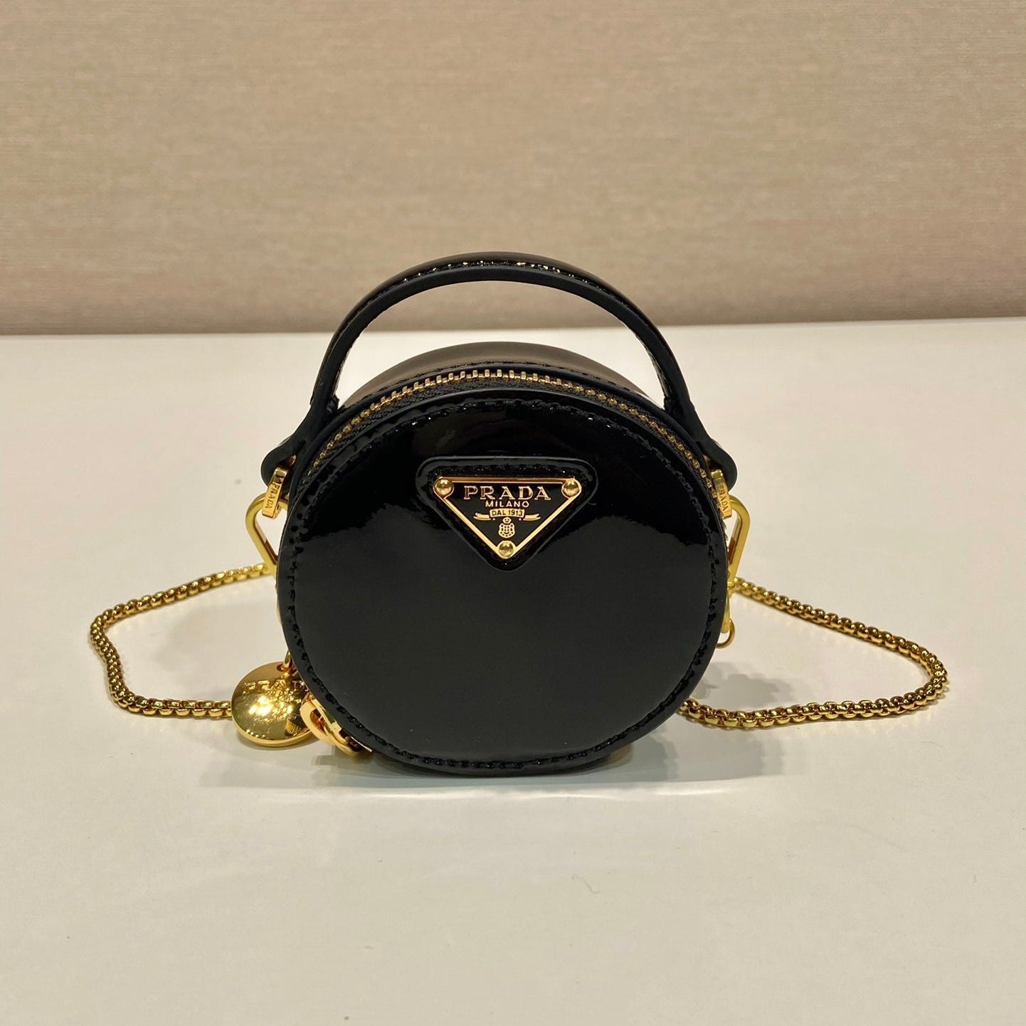 Luxury PradaMINI ROUND BAG 8 IN BLACK GLOSSY CALFSKIN GOLD HARDWARE