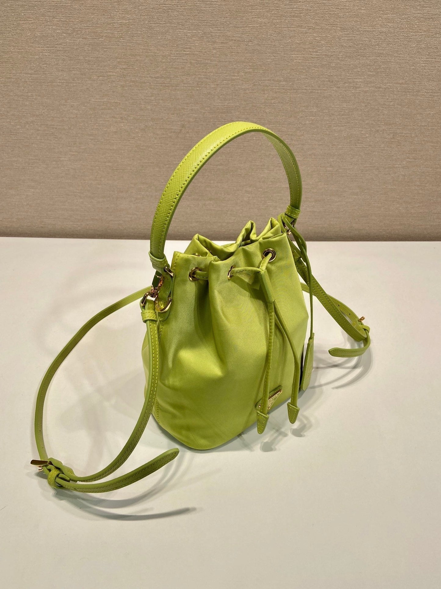 Luxury PradaBUCKET BAG 19 IN APPLE GREEN RE-NYLON AND SAFFIANO LEATHER HANDLE