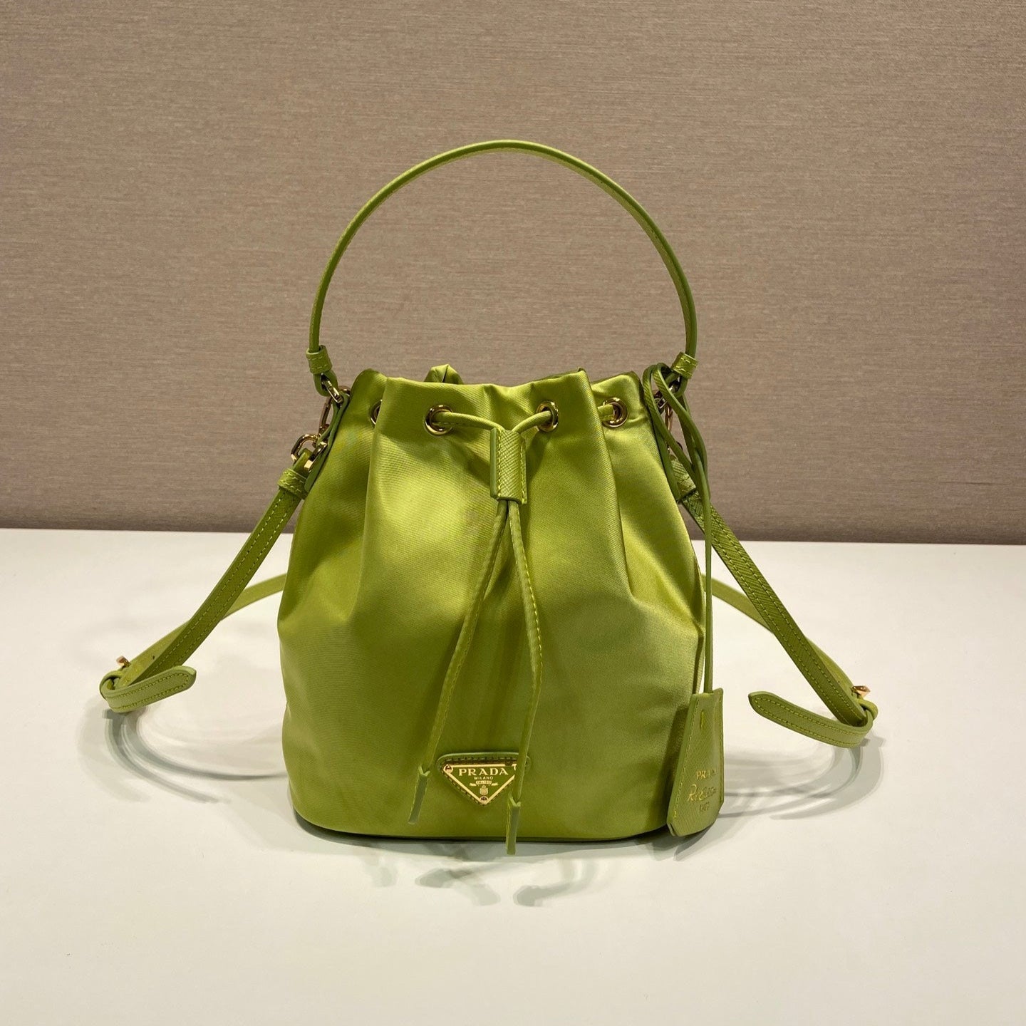 Luxury PradaBUCKET BAG 19 IN APPLE GREEN RE-NYLON AND SAFFIANO LEATHER HANDLE