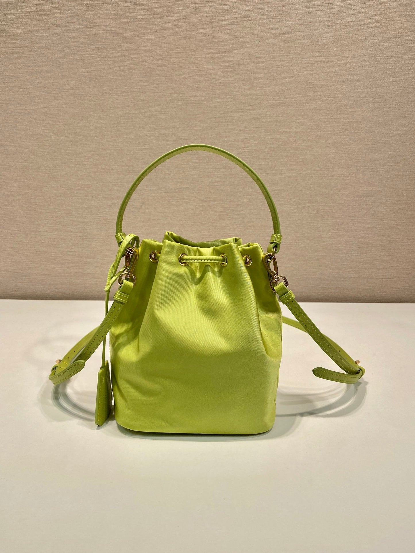 Luxury PradaBUCKET BAG 19 IN APPLE GREEN RE-NYLON AND SAFFIANO LEATHER HANDLE