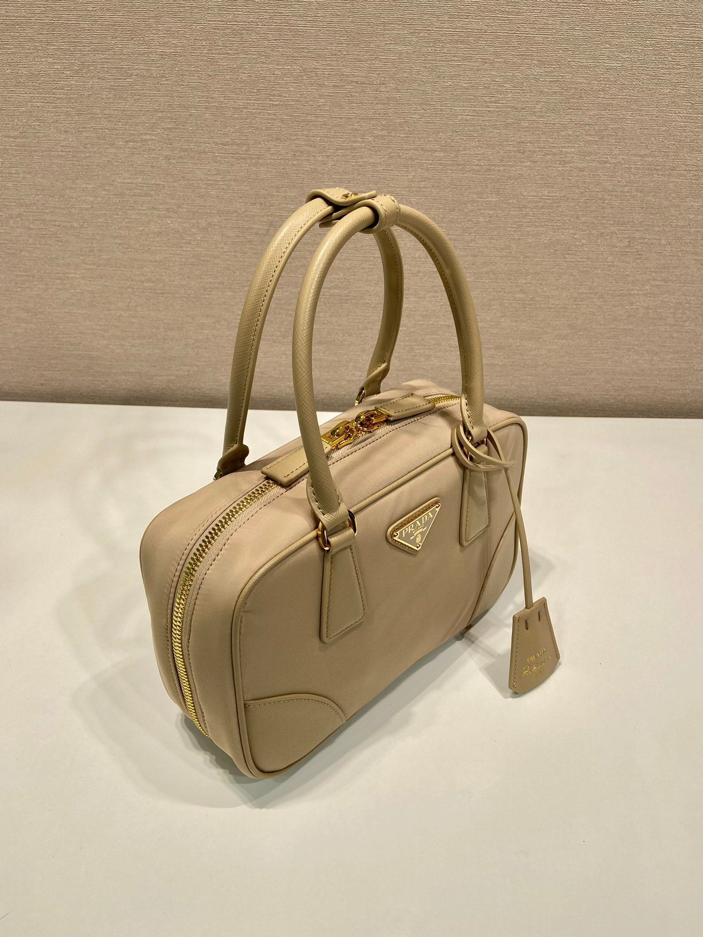 Luxury PradaSMALL TOP HANDLE BAG 25 IN DRIED MOSS NYLON AND CALFSKIN TRIM