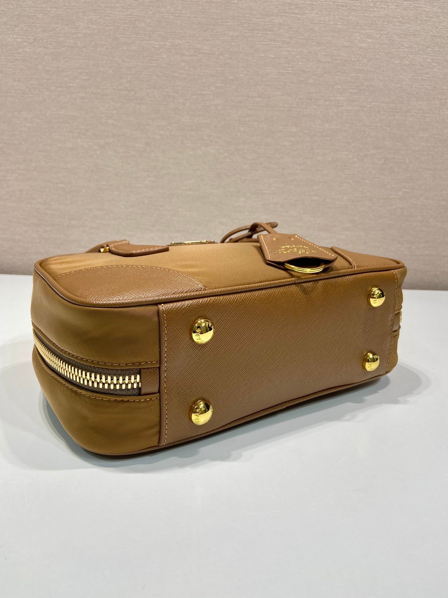 Luxury PradaSMALL TOP HANDLE BAG 25 IN GOLDEN BROWN NYLON AND CALFSKIN TRIM