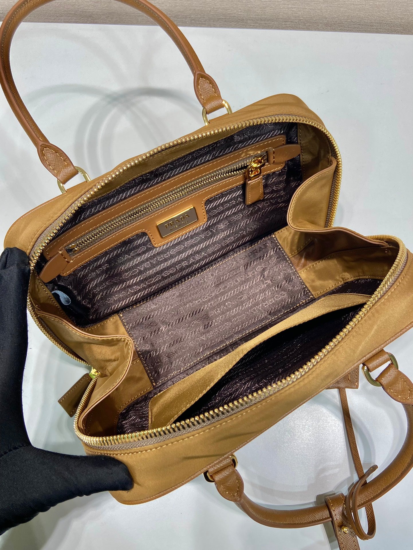 Luxury PradaSMALL TOP HANDLE BAG 25 IN GOLDEN BROWN NYLON AND CALFSKIN TRIM