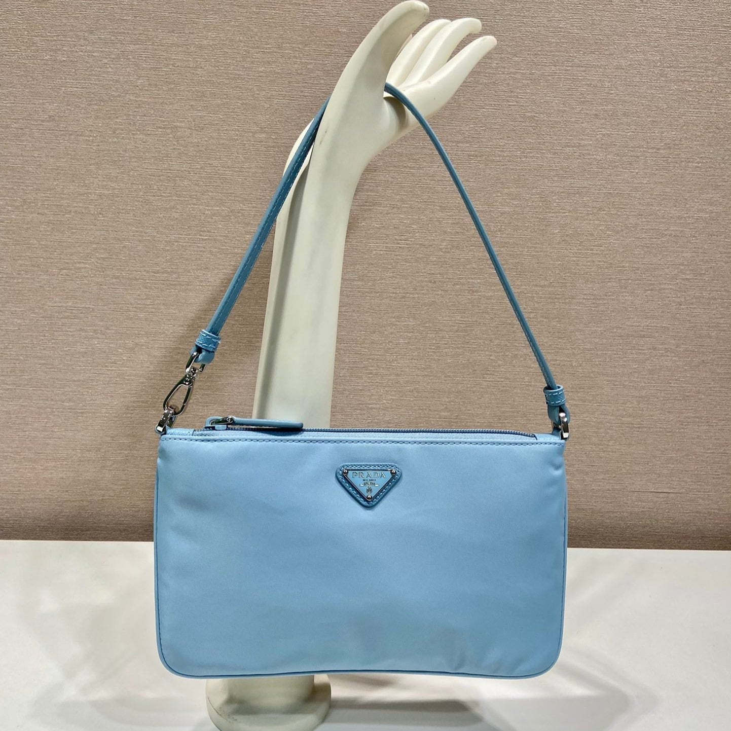 Luxury PradaSHOULDER BAG 24 WITH TRIANGLE LOGO IN SKY BLUE RE-NYLON FABRIC