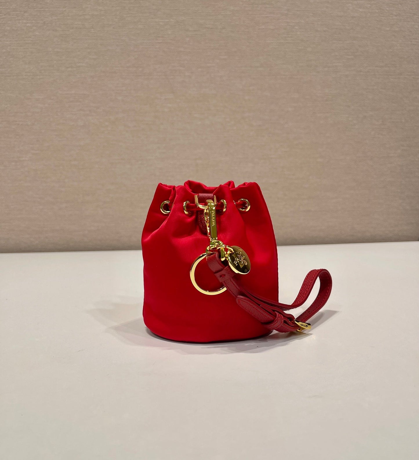 Luxury PradaMINI BUCKET BAG 10 IN RED RE-NYLON AND SAFFIANO LEATHER STRAP