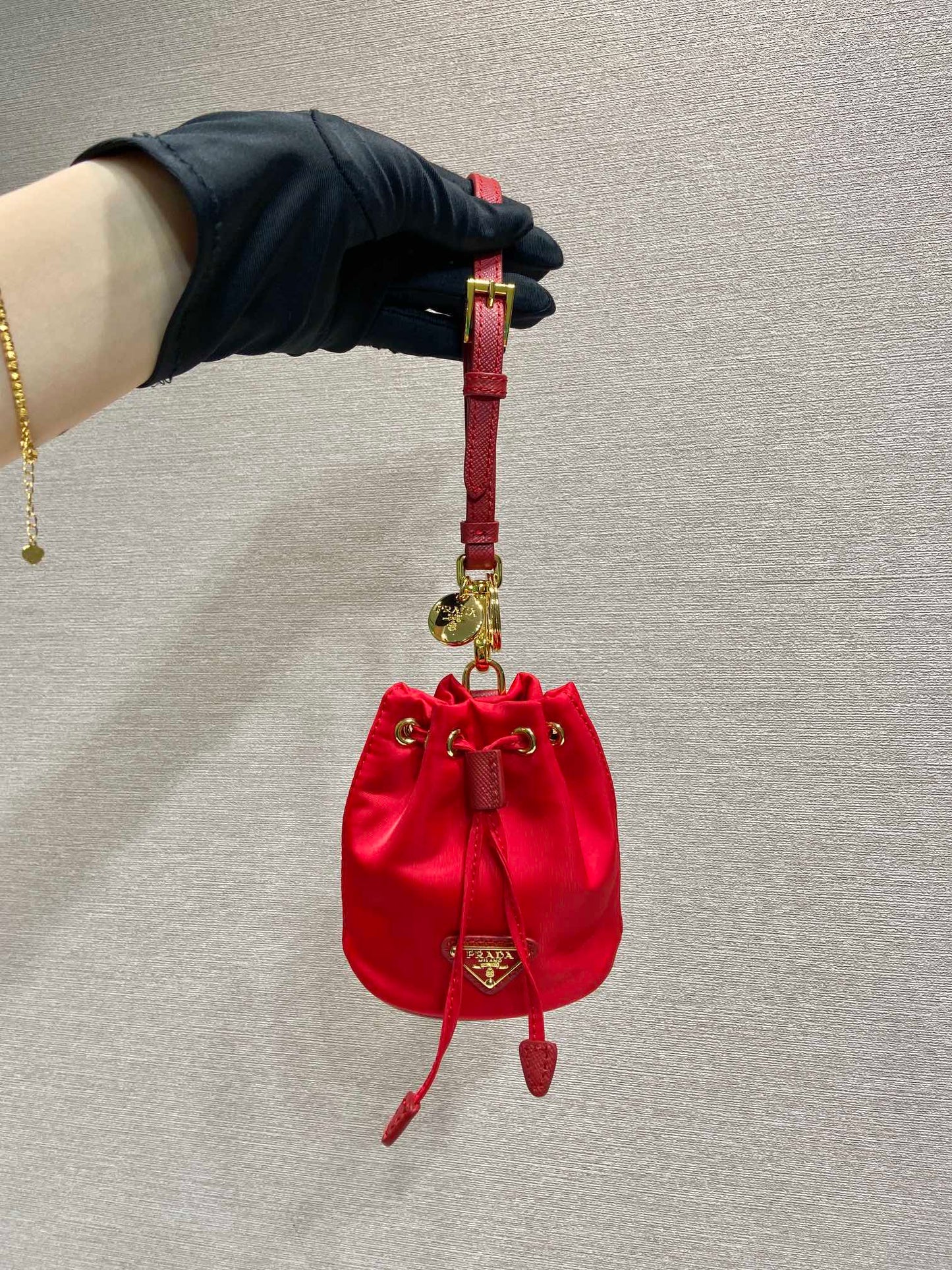 Luxury PradaMINI BUCKET BAG 10 IN RED RE-NYLON AND SAFFIANO LEATHER STRAP