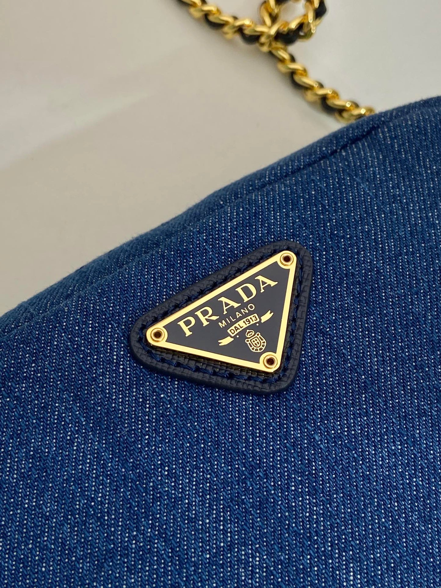 Luxury PradaMINI BAG 14 IN AZURE BLUE DENIM GOLD HARDWARE