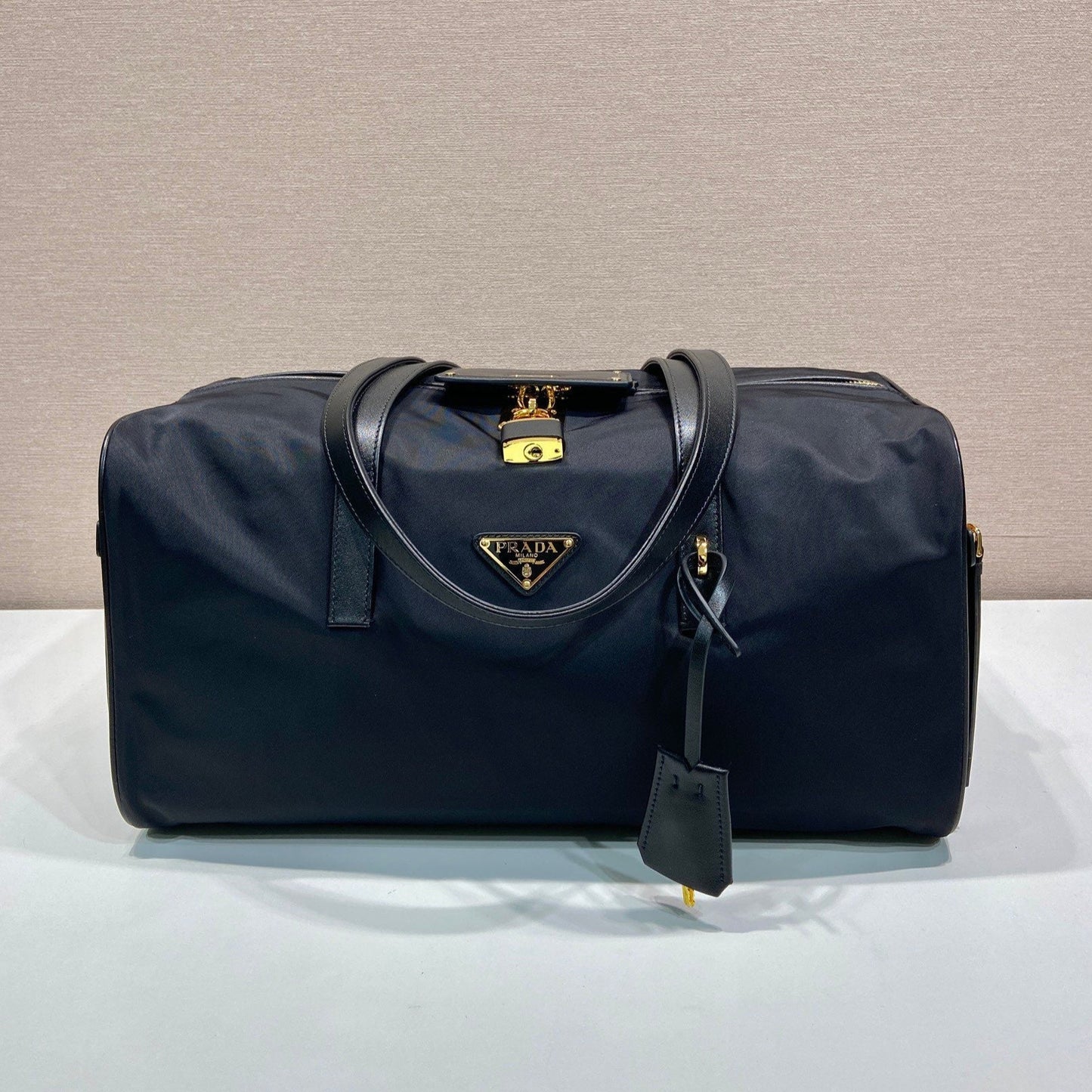 Luxury PradaTRAVEL BAG 40 IN BLACK WATERPROOF FABRIC GOLD PADLOCK