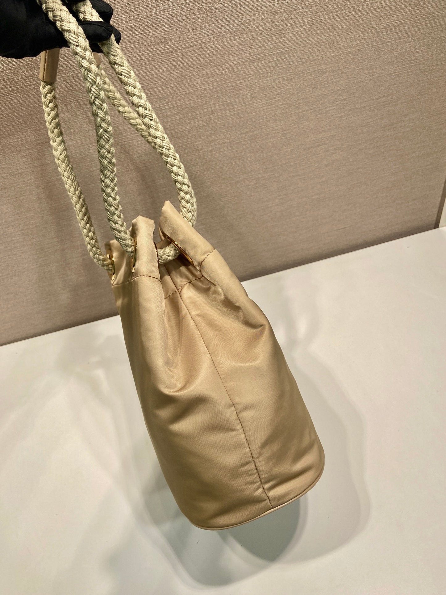 Luxury PradaBUCKET BAG 28 IN BEIGE RE-NYLON GOLD LOGO