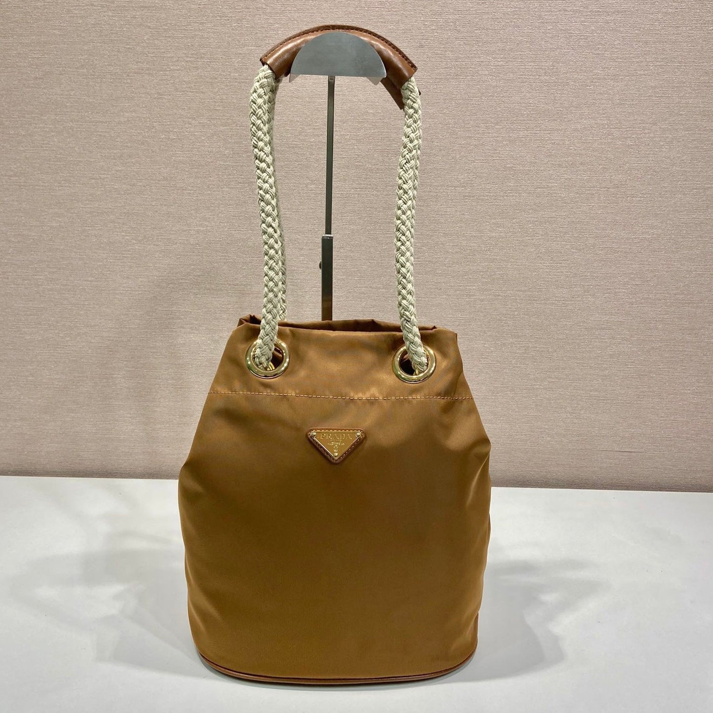 Luxury PradaBUCKET BAG 28 IN SEPIA BROWN RE-NYLON GOLD LOGO