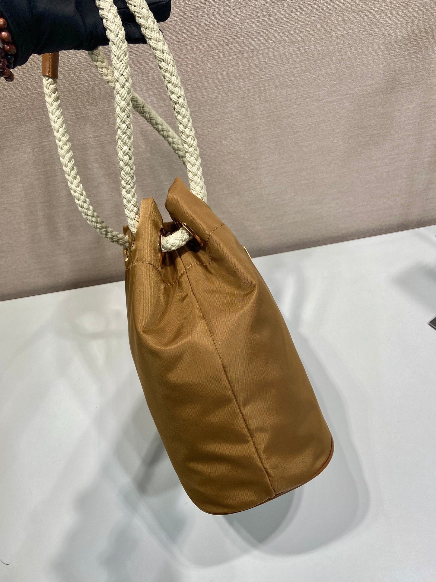 Luxury PradaBUCKET BAG 28 IN SEPIA BROWN RE-NYLON GOLD LOGO