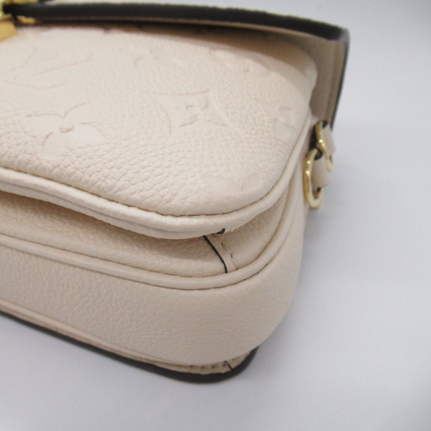 Louis Vuitton Monogram Empreinte Leather Pochette Metis