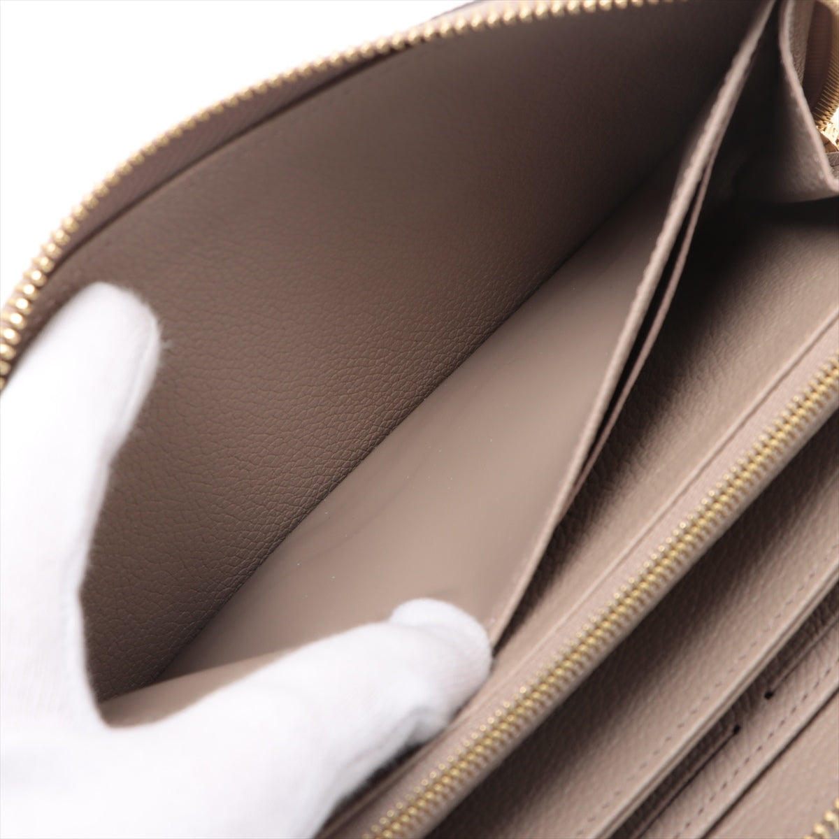 Louis Vuitton Vial Monogram Implant Zippyr Wallet M69794 Turtle Cream Round Zipper Wallet