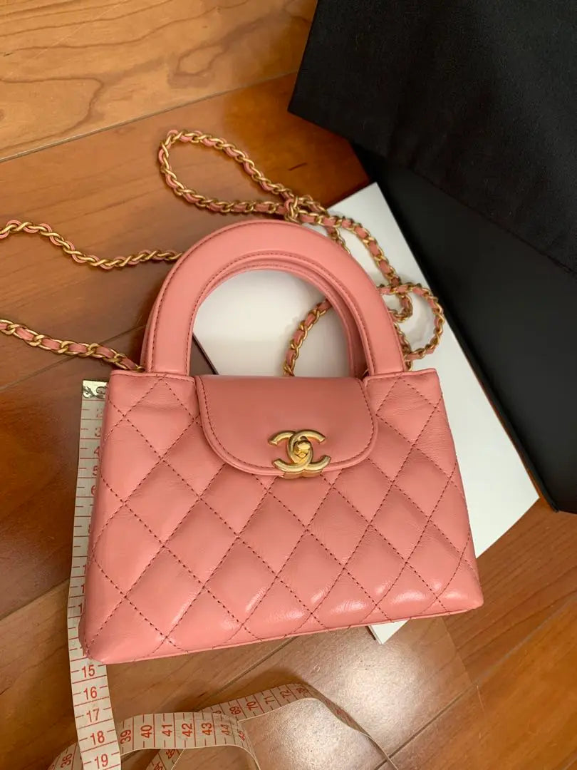 Luxury Chanel Kelly Top Handle Shopping Bag Quilted Shiny Aged Calfskin Mini
