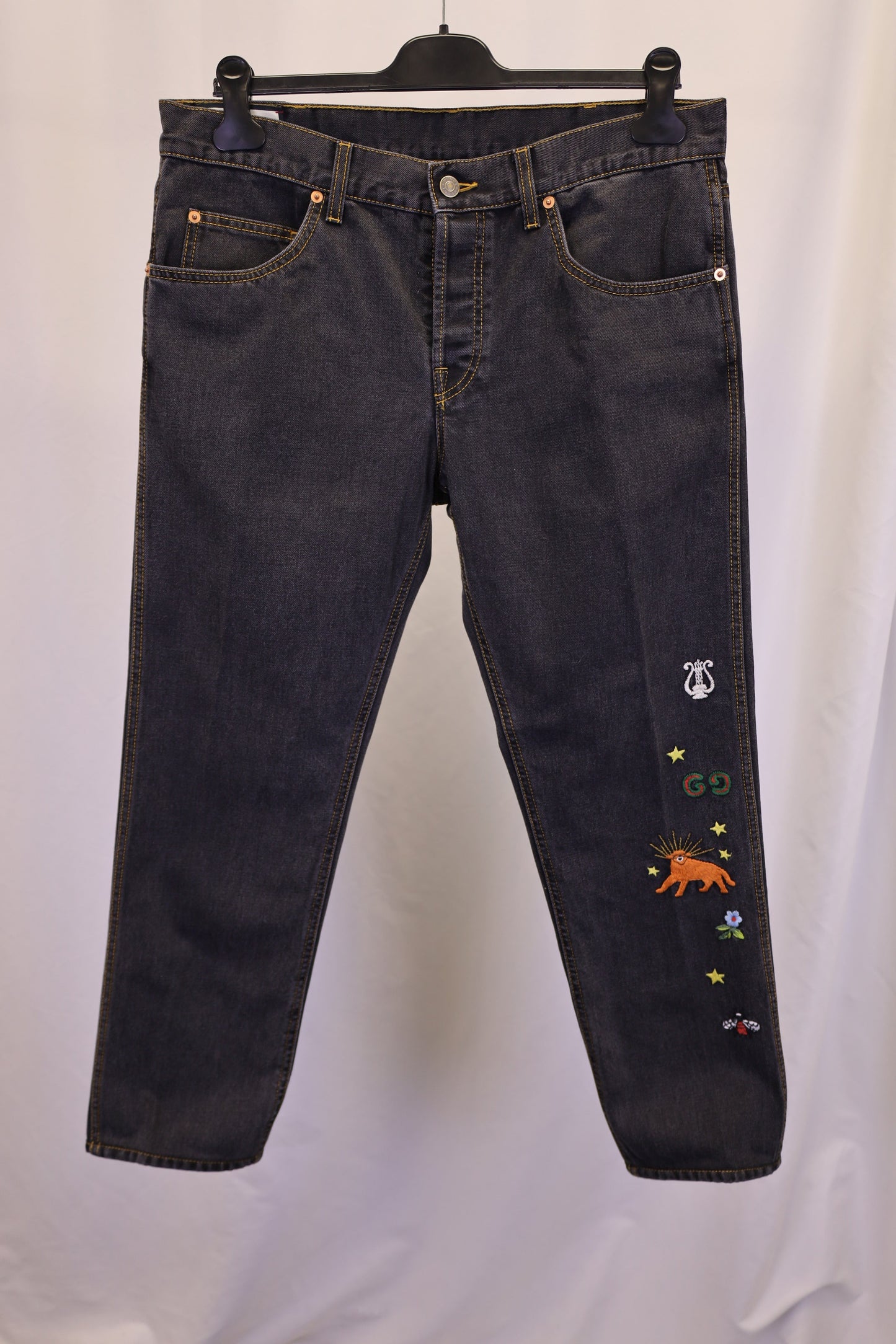 Gucci Embroidered Motif Slim-fit Jeans In Navy Blue Cotton