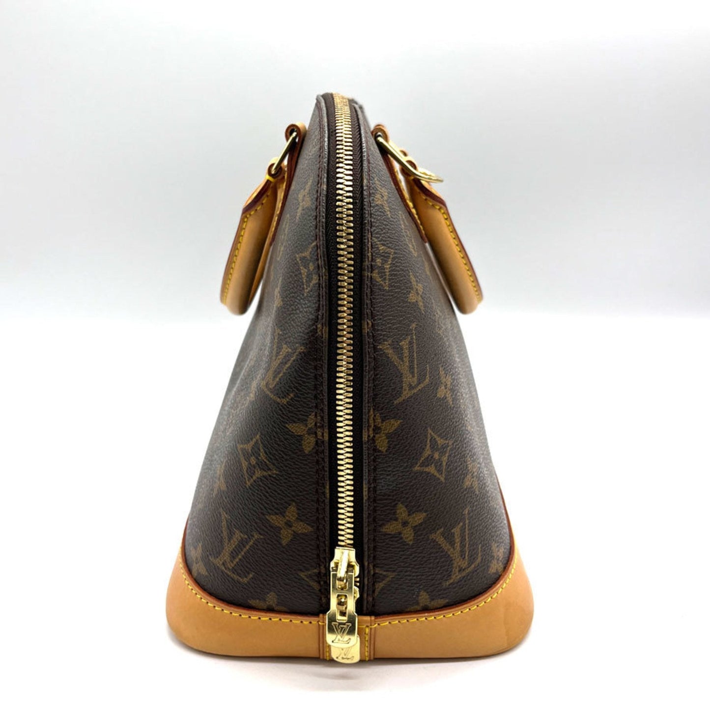 Louis Vuitton Alma  Canvas Handbag ()
