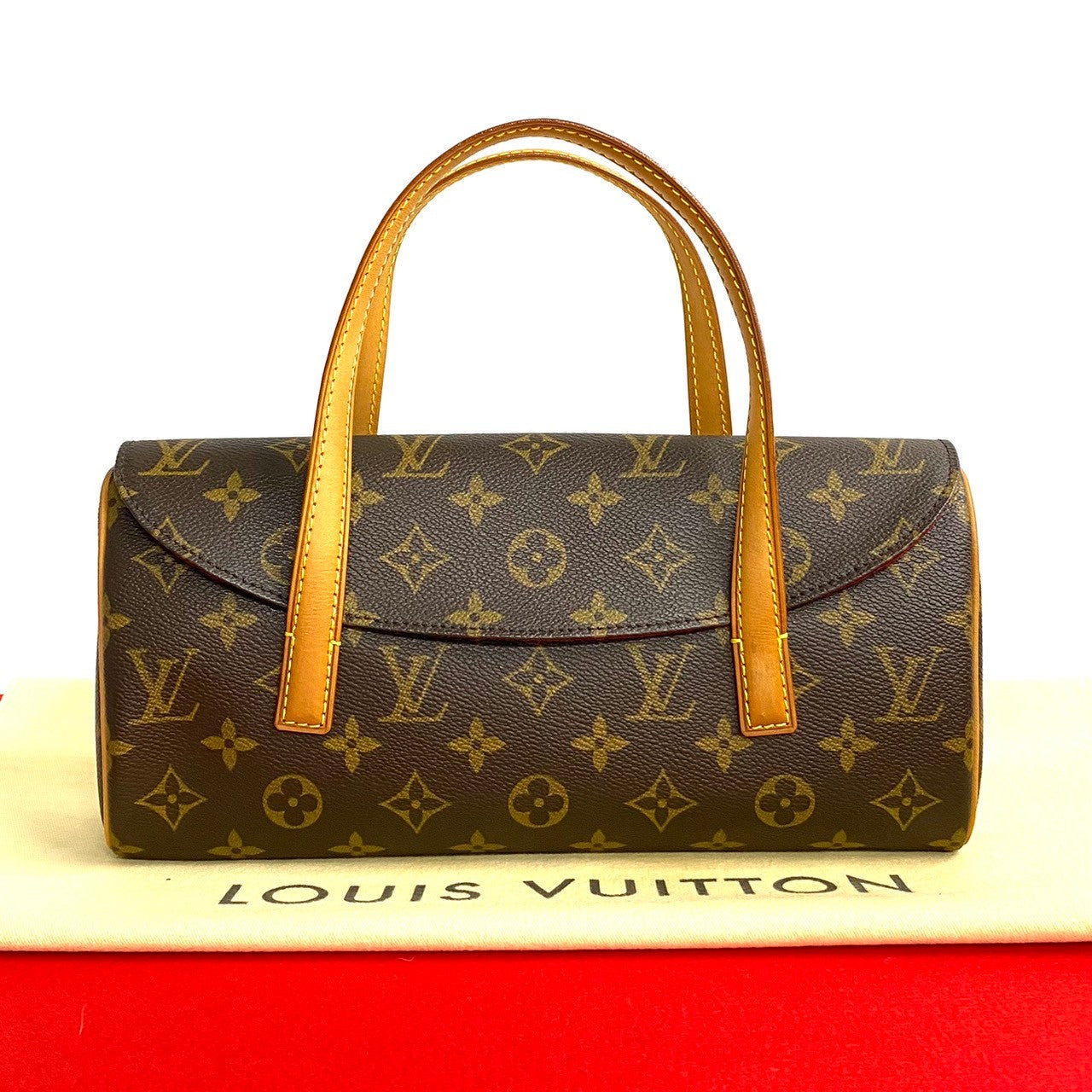 Louis Vuitton Vintage Sonatine Leather Handbag Brown