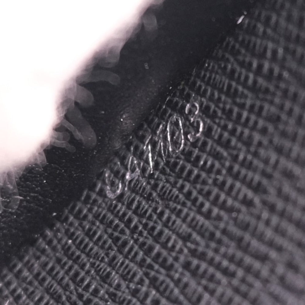 Louis Vuitton Taiga Zippy Wallet Vertical