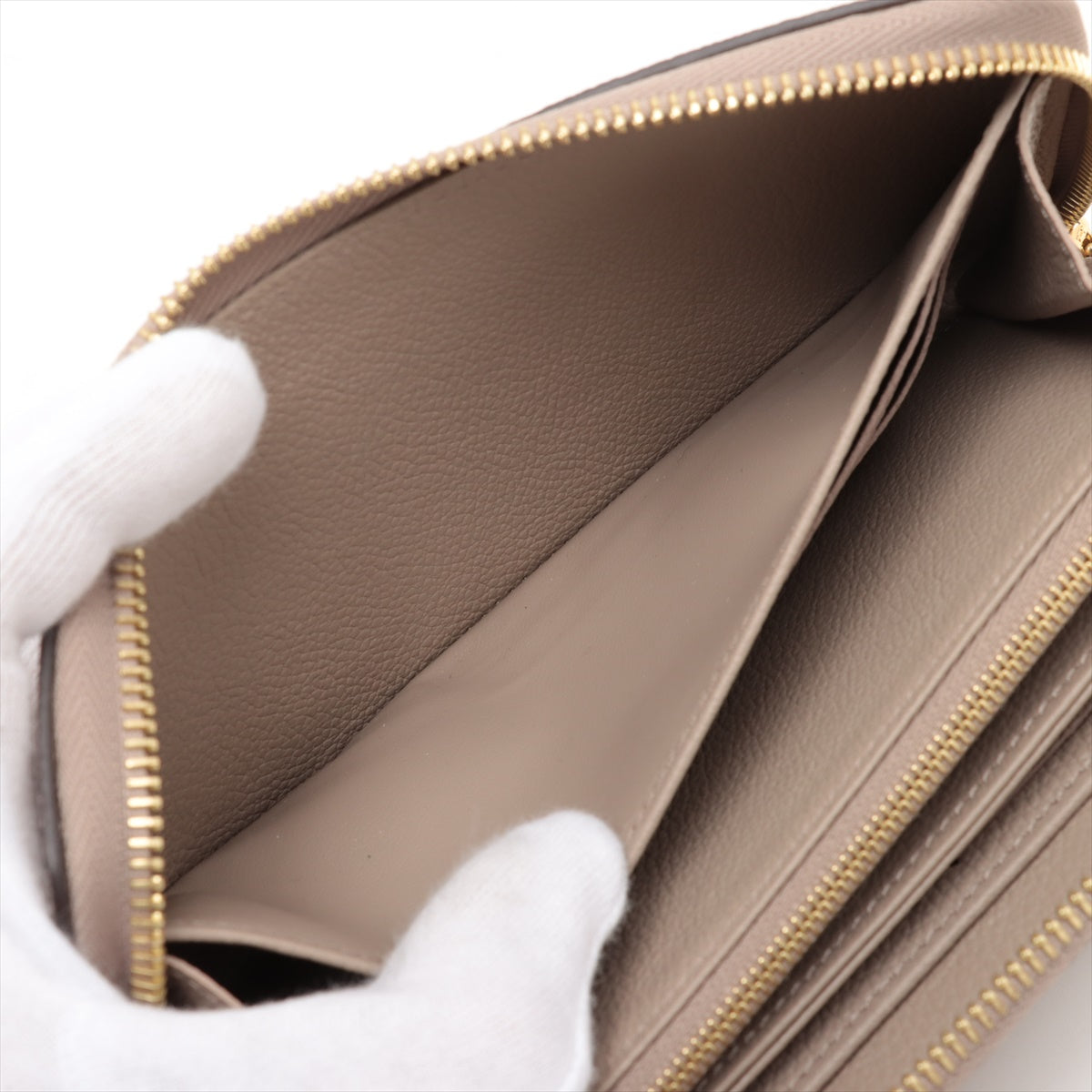 Louis Vuitton Vial Monogram Implant Zippyr Wallet M69794 Turtle Cream Round Zipper Wallet