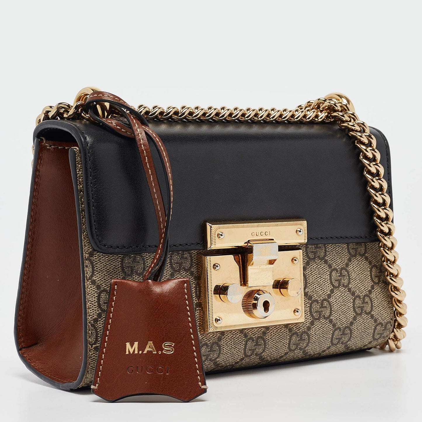 Luxury Gucci Trending 2025 Black/beige Gg Supreme Canvas And Leather Small Padlock Shoulder Bag..