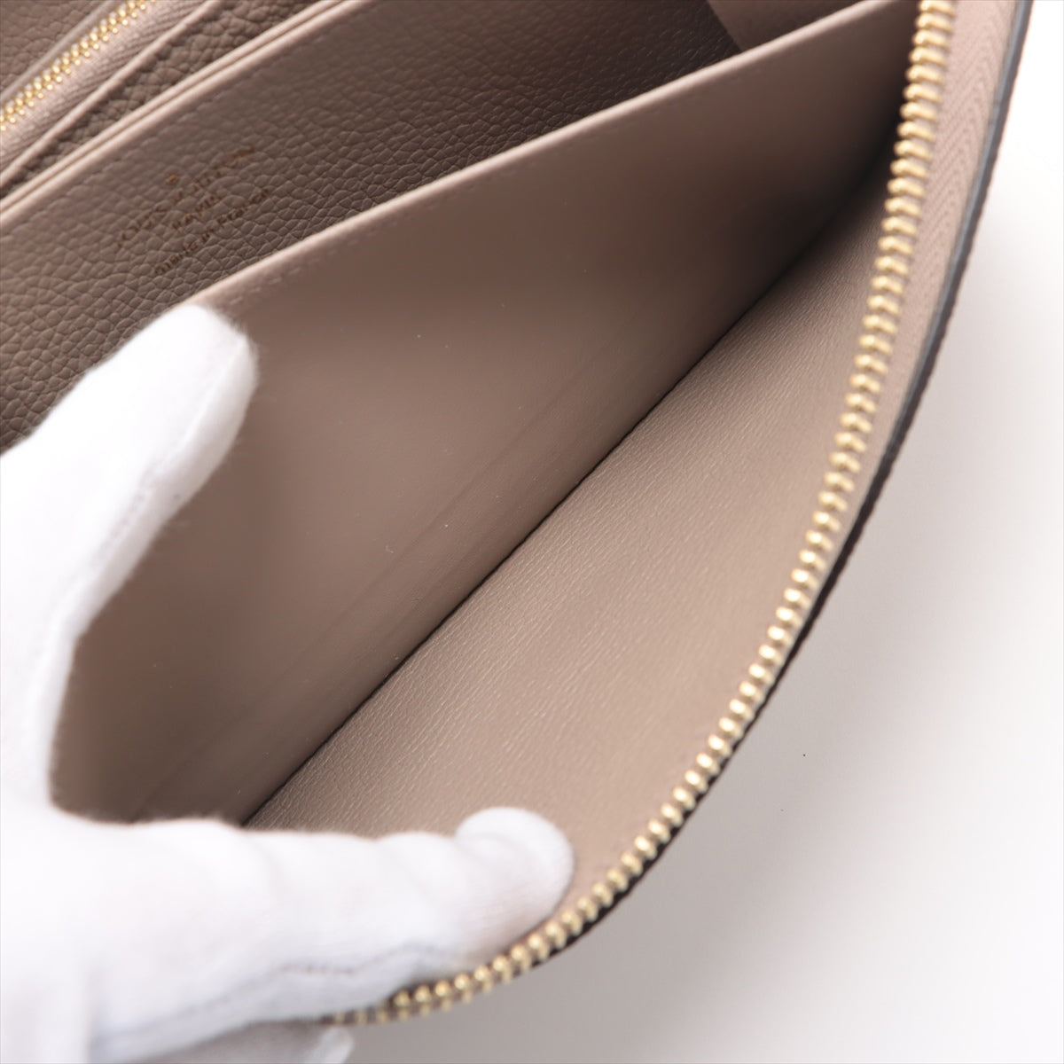 Louis Vuitton Vial Monogram Implant Zippyr Wallet M69794 Turtle Cream Round Zipper Wallet