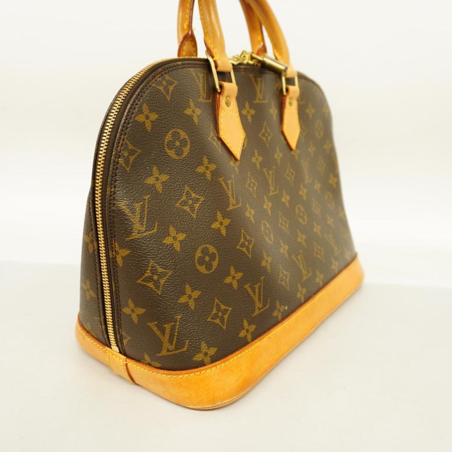 Louis Vuitton Alma  Canvas Handbag ()