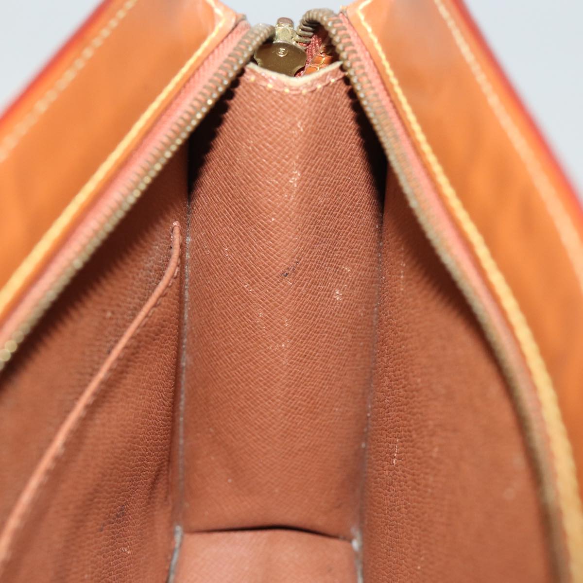 LOUIS VUITTON Epi Pochette Homme Bag Brown Zipang gold M52528 LV 74311