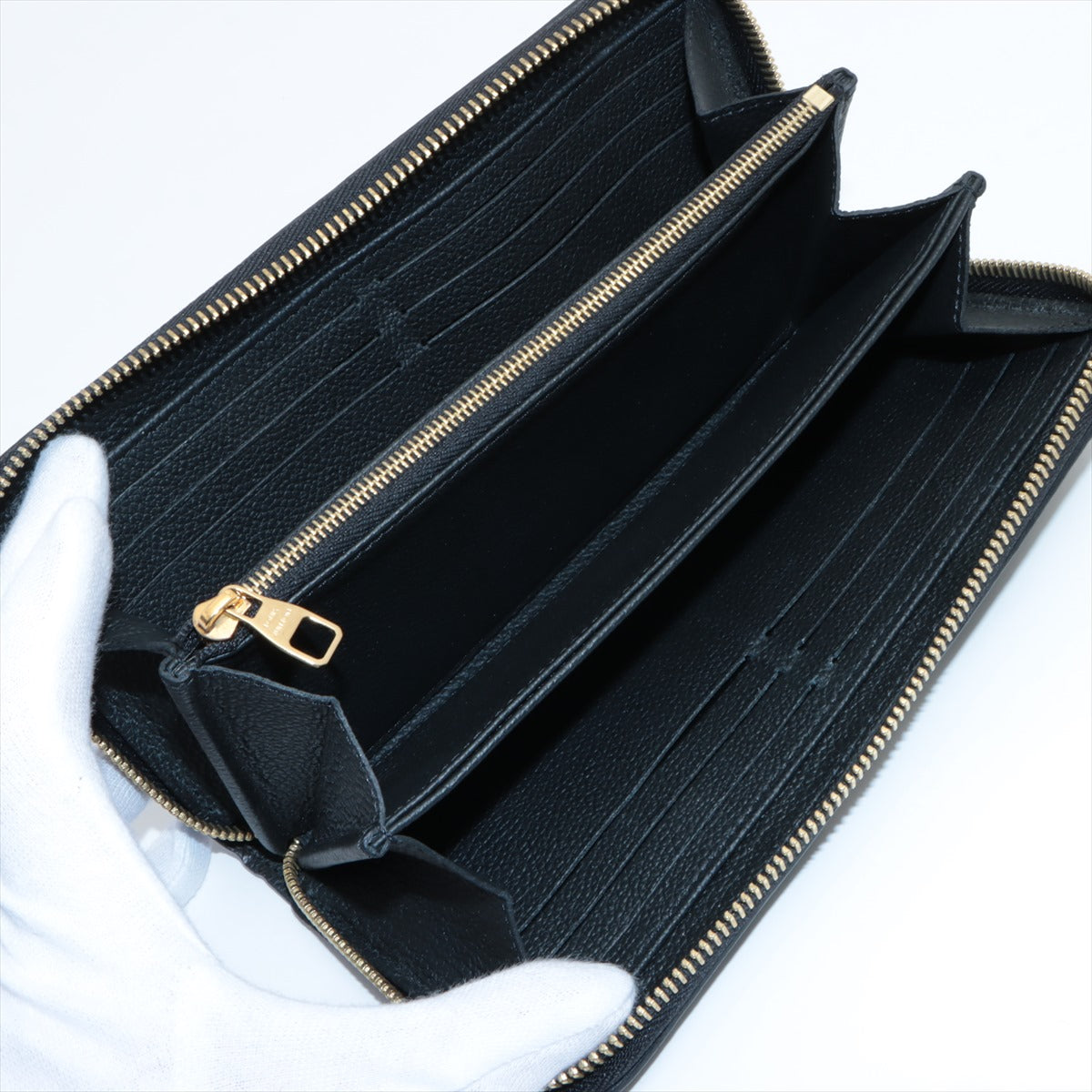 Louis Vuitton Bi-Color Monogram Implant Zippyr Wallet M80481