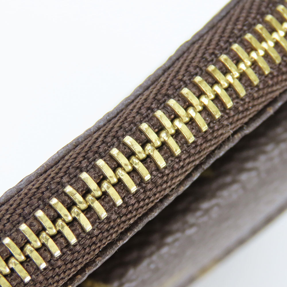 Louis Vuitton Monogram Coin Case M60025