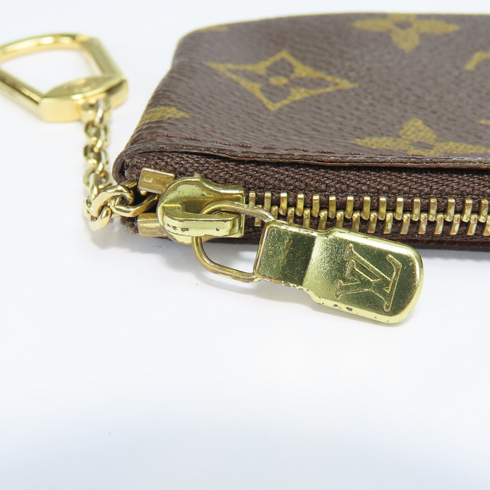 Louis Vuitton Monogram Coin Case Pochette Kle M62650