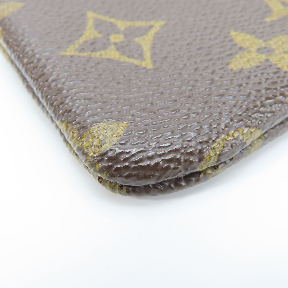 Louis Vuitton Monogram Coin Case Pochette Kle M62650