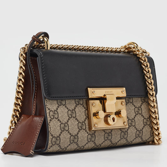 Luxury Gucci Trending 2025 Black/beige Gg Supreme Canvas And Leather Small Padlock Shoulder Bag..
